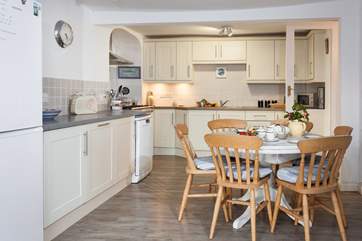 The lovely kitchen has a small dining-table if you fancy a more laid back lunch.