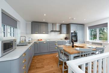 The bespoke first floor kitchen and dining area.