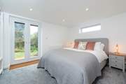 Bedroom 1 is located on the ground floor and has a king-size bed.