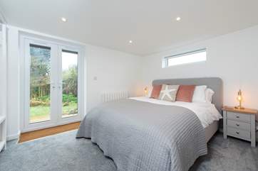 Bedroom one is located on the ground floor and has a king-size bed.