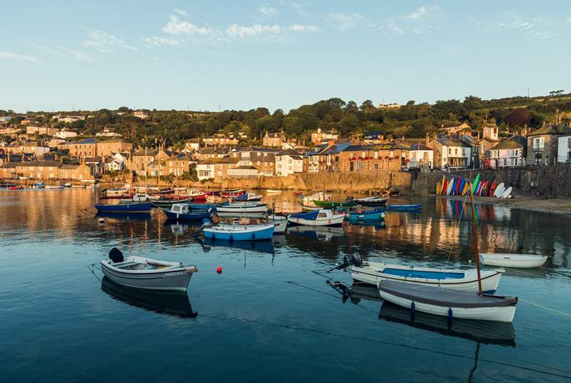 The enchanting village of Mousehole is a short drive away.