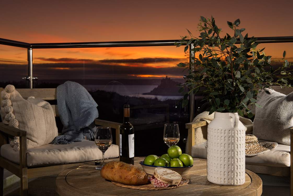The balcony is the perfect spot for a pre supper glass of fizz.