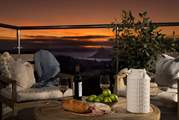 The balcony is the perfect spot for a pre supper glass of fizz.