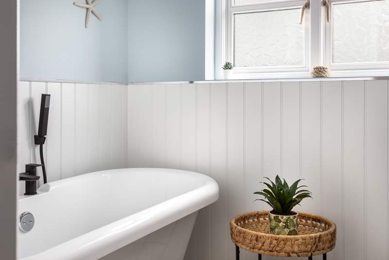 The beautiful family shower-room has a fabulous very indulgent roll-top bath to enjoy - bliss! 