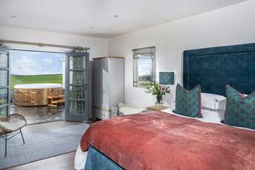 The master bedroom is an oasis of calm with a super-comfy bed.