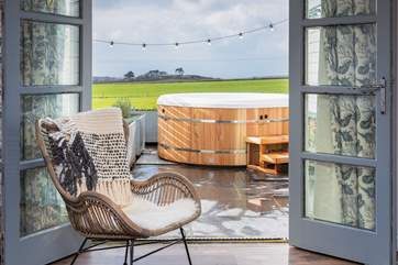 Open up the French doors, and step up into the hot tub.