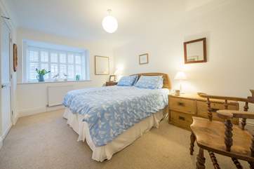 The main bedroom on the first floor has a 'zip and link' bed and can be made up as a super-king double or twin beds.