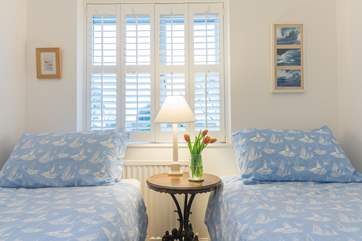 The light and airy twin bedroom on the first floor.