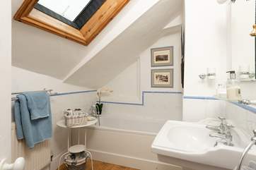 This stylish bathroom is one of two on the first floor.
