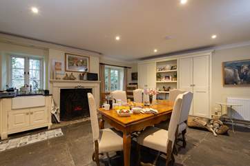 The country-style kitchen/dining-room has patio doors opening up to the attractive garden. Enjoying a spot of breakfast will be a treat in here.