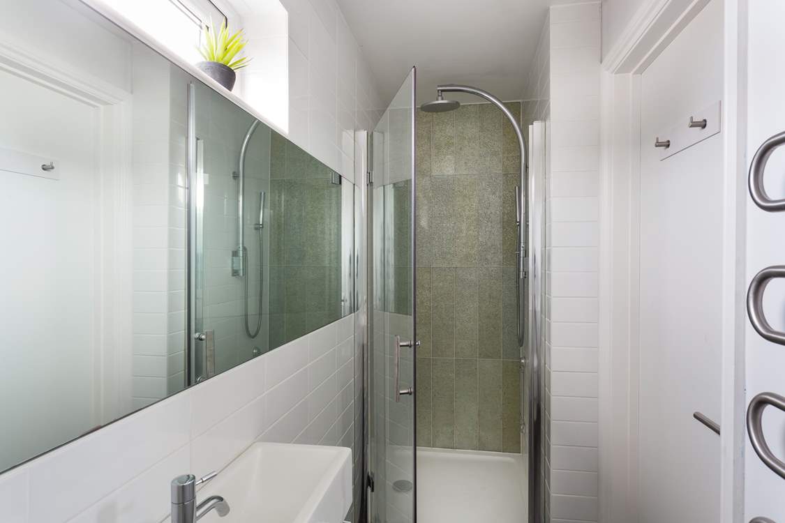 Bedroom 1 has an en suite shower-room.