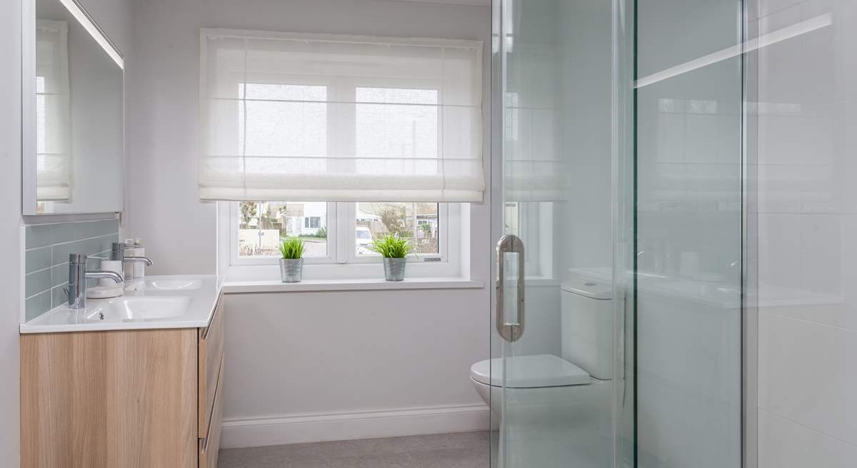 The gorgeous family shower-room with twin sinks located on the first floor. 