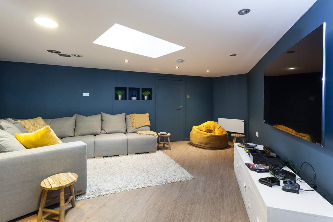 The cinema room is a great place for the kids (and adults too) to enjoy a movie night - don't forget the popcorn!