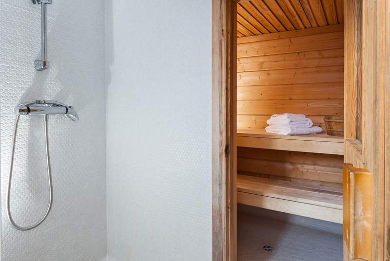 The sauna has an outside shower too - perfect for showering the sand off, after a day at the beach.