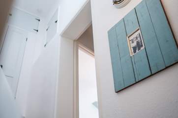 Both bedrooms and the bathroom are up the stairs. The master bedroom and main bathroom are the first on the right then you climb the final stairs to the twin bedroom.