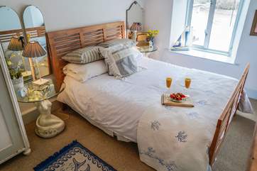 From the king-size bed you can enjoy views of the estuary across to the neighbouring village.