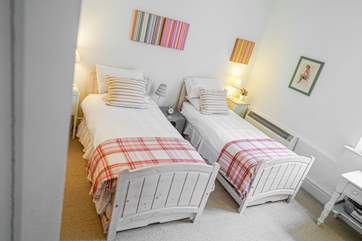 The twin room is a large room offering space for children to play and enjoy some time out at the end of the day, there is also a TV and video player.