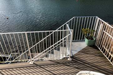 Steps down to the lower terrace; this is locked and should be locked if children are unattended.