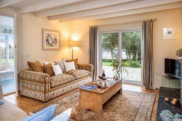 Enjoy a glass of wine on the large sofas.