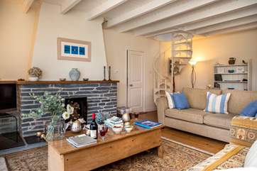 There are so many beautiful features in this property; the pretty spiral staircase in the corner leads up to the master bedroom.