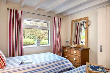 This bedroom overlooks the pretty garden (Bedroom 2).