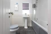 The family bathroom is located on the ground floor.