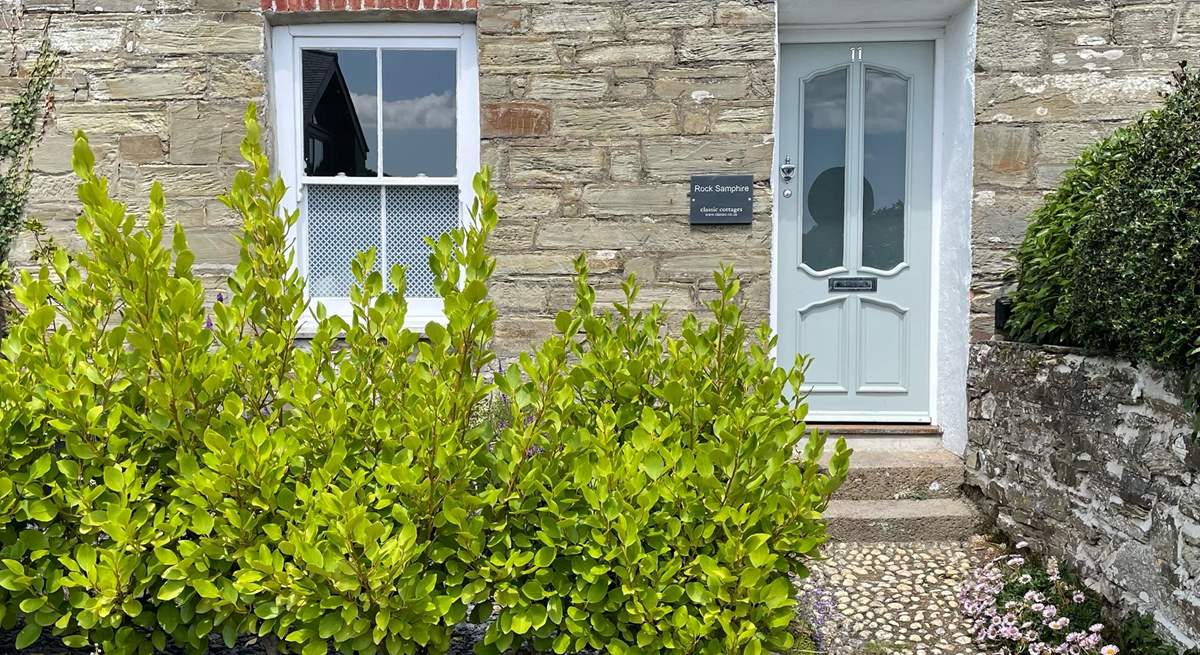 Welcome to Rock Samphire, a gorgeous cottage in St Agnes. One step leads up from the pavement to the garden path, and then a further two steps lead into the cottage.