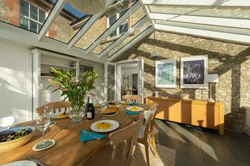 The garden-room is an ideal dining space with plenty of light during the day, the stars at night and wonderful country views.