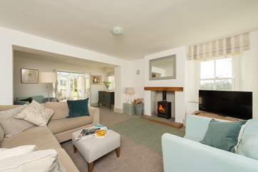 This is the gracious main sitting-room. Double doors lead into the garden-room.