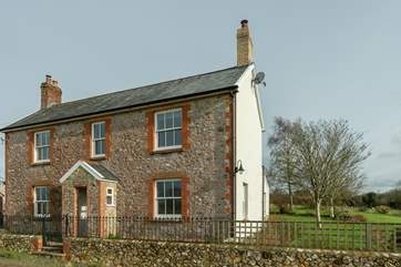 This is the front face of the farmhouse. Parking is in the courtyard behind the house and the gardens spread out to the south.
