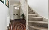 The traditional front entrance hall. The stairs lead to three of the four bedrooms. - Thumbnail Image