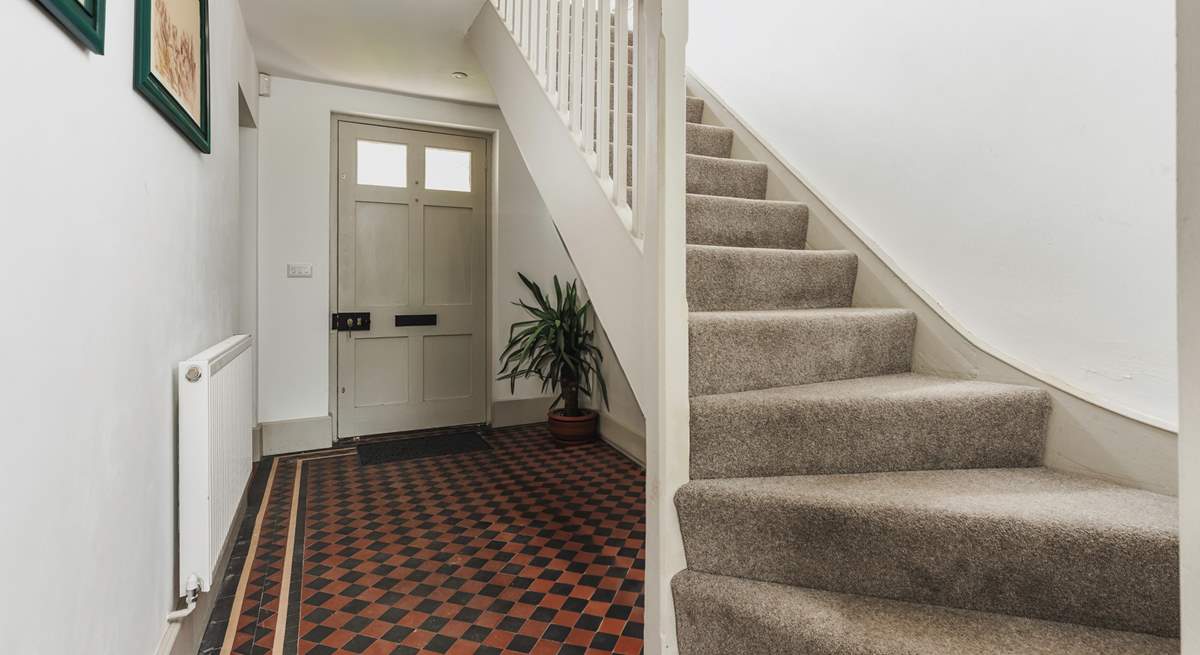 The traditional front entrance hall. The stairs lead to three of the four bedrooms.