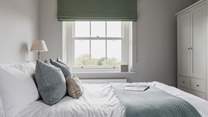 This lovely double bedroom also has a rural outlook and a second window to the courtyard at the back of the farmhouse.