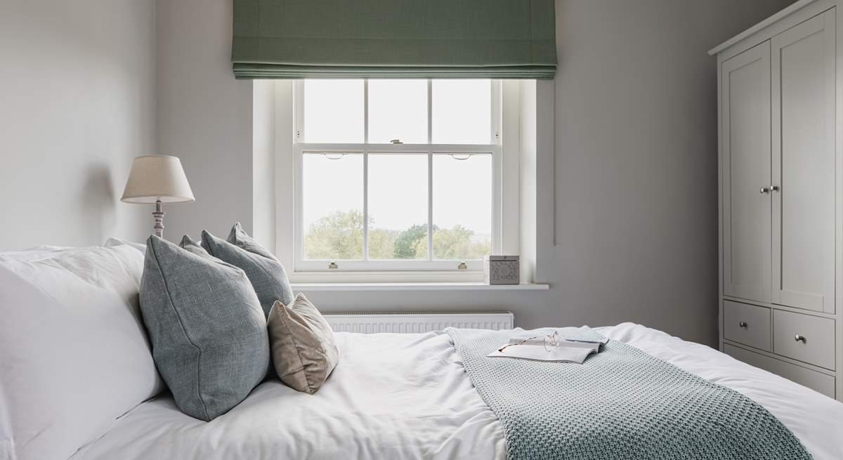 This lovely double bedroom also has a rural outlook and a second window to the courtyard at the back of the farmhouse.