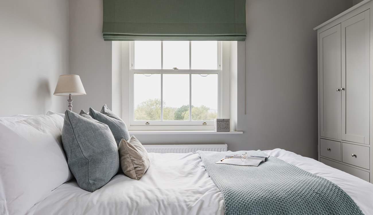 This lovely double bedroom also has a rural outlook and a second window to the courtyard at the back of the farmhouse.