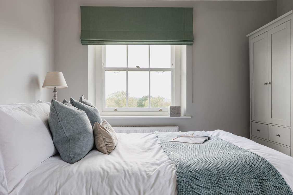 This lovely double bedroom also has a rural outlook and a second window to the courtyard at the back of the farmhouse.