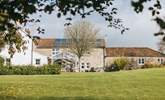 The owners live in the single-storey property attached to the Farmhouse - it can be seen to the right of this photo. There is a locked internal door between the two properties. - Thumbnail Image