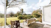 Step out from the dining-area onto the terrace that has some glorious views!