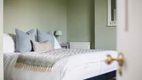 The thoughtful interiors are complemented by the soft furnishings.
