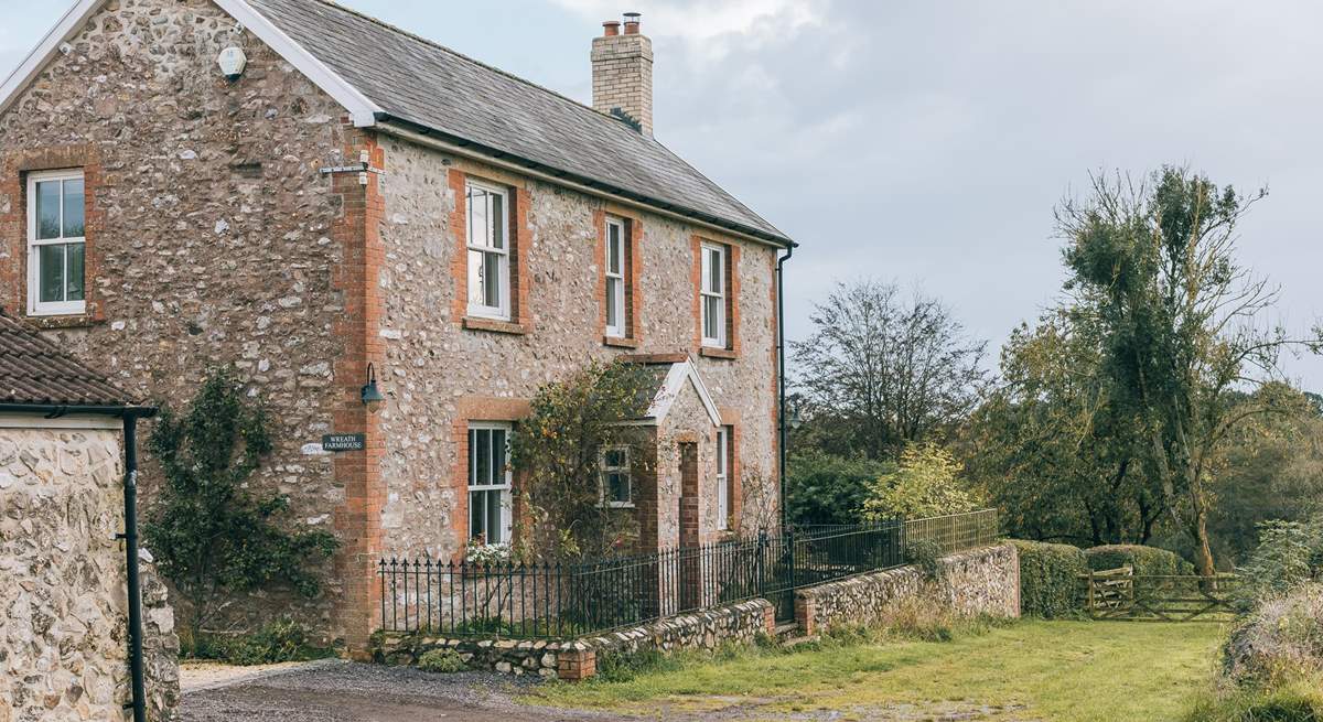 The driveway sweeps round to the left into the courtyard where you will find the parking for the farmhouse. 