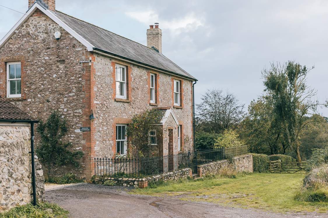 The driveway sweeps round to the left into the courtyard where you will find the parking for the farmhouse.
