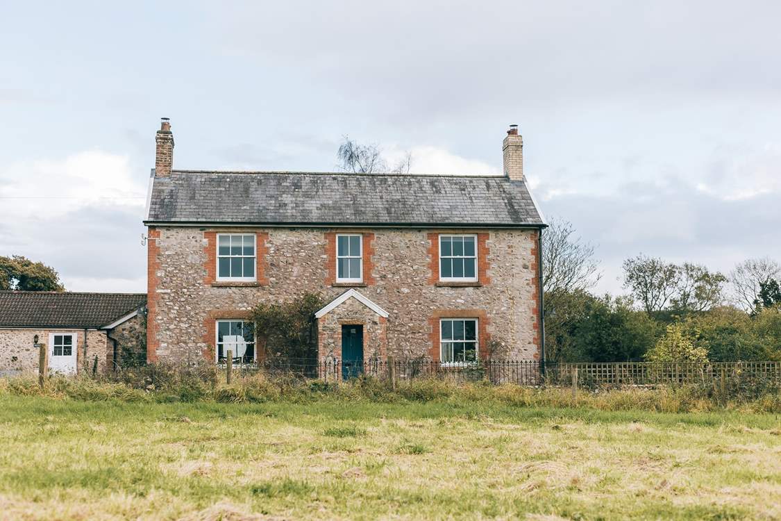 This is the front face of the farmhouse. Parking is in the courtyard behind the house and the gardens spread out to the south.