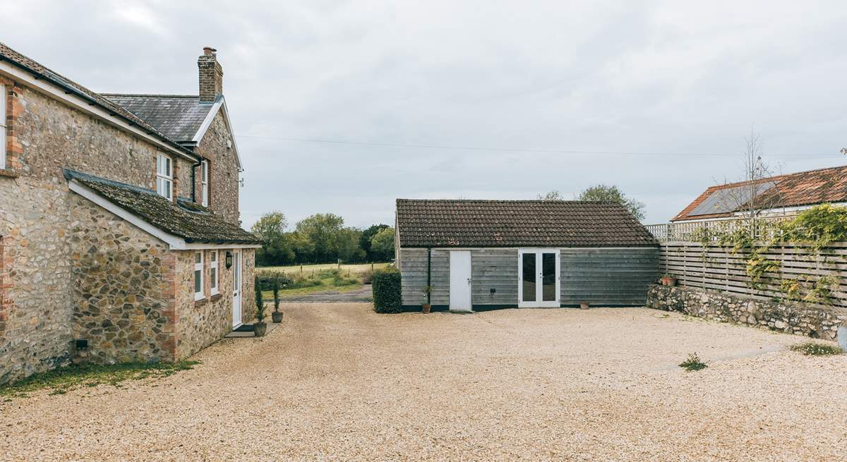 Here you can see the games-room opposite the boot room door. This is shared with the neighbouring cottages - The Cowshed and The Apple Press.