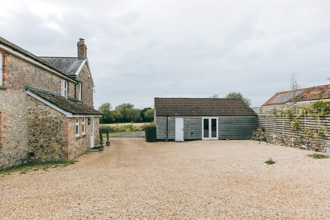 Here you can see the games-room opposite the boot room door. This is shared with the neighbouring cottages - The Cowshed and The Apple Press.