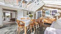 The garden-room is an ideal dining space with plenty of light during the day, the stars at night and wonderful country views.