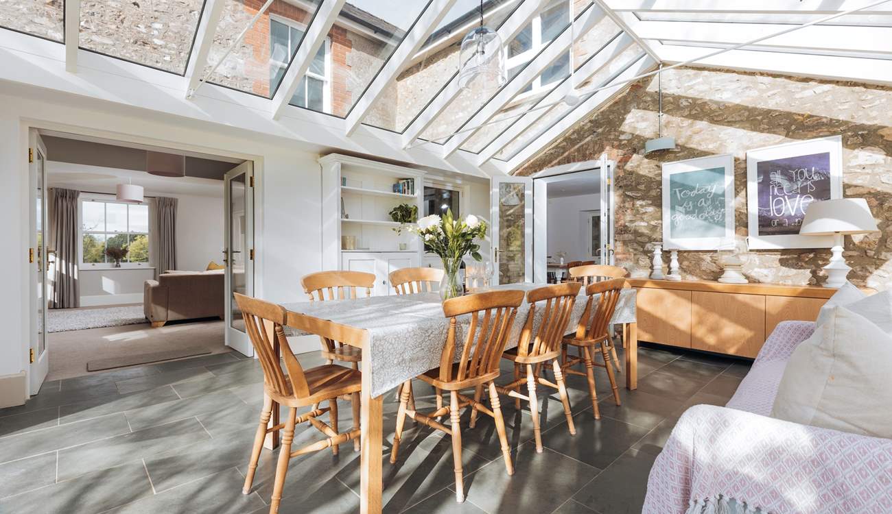 The garden-room is an ideal dining space with plenty of light during the day, the stars at night and wonderful country views.