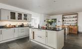 The wonderful farmhouse kitchen with island, breakfast-bar, breakfast-table and flagstone floors. - Thumbnail Image