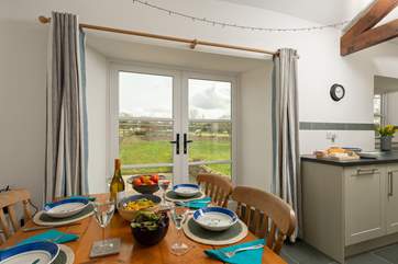 The field beyond your garden is sometimes home to a flock of sheep. A delightful rural scene for your holiday.