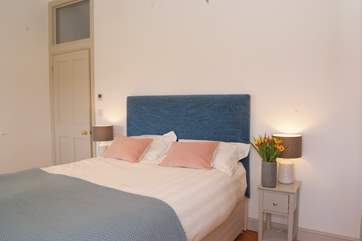 This is one of the two spacious double bedrooms. This bedroom looks out over the farmhouse garden and to the valley beyond. A privacy fence separates the two properties.