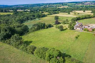The Stables is the single-storey building in the foreground. The farmstead is at the very end of a no-through country lane and is surrounded by glorious countryside.